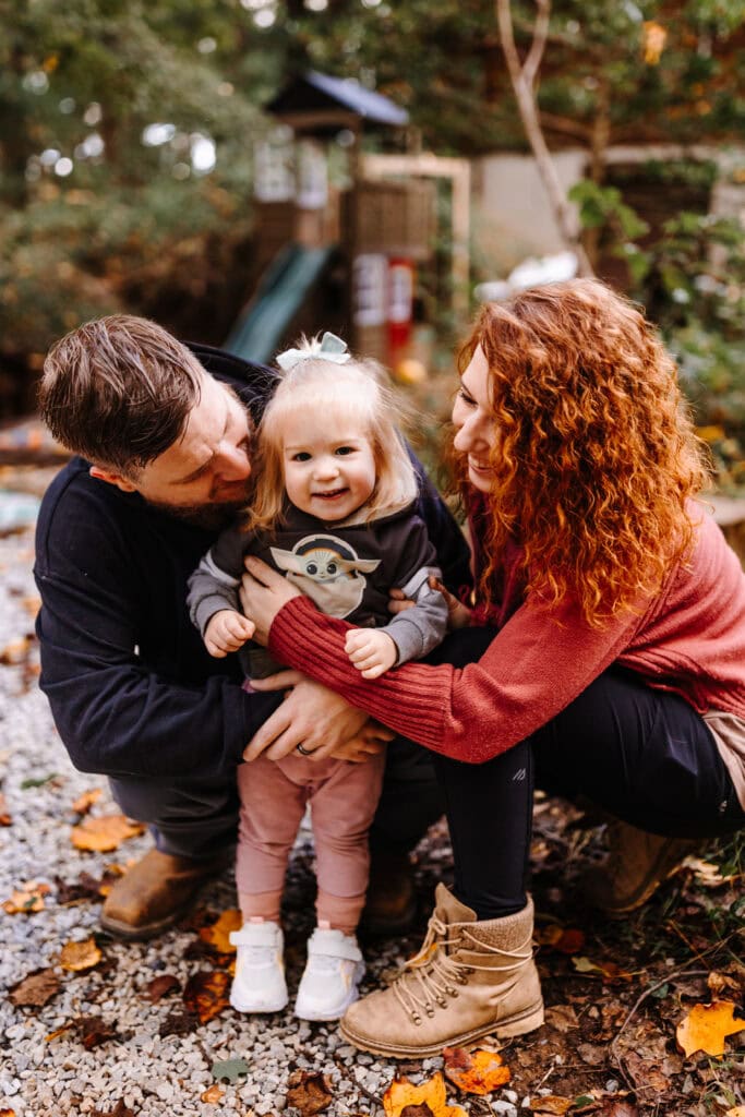 Family photo of Elizabeth and Zack with their daughter Kira