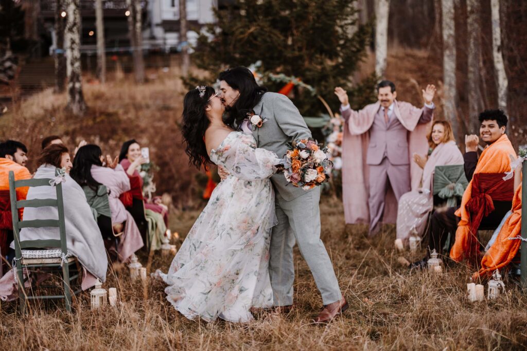 Outdoor ceremony location with invited guests.