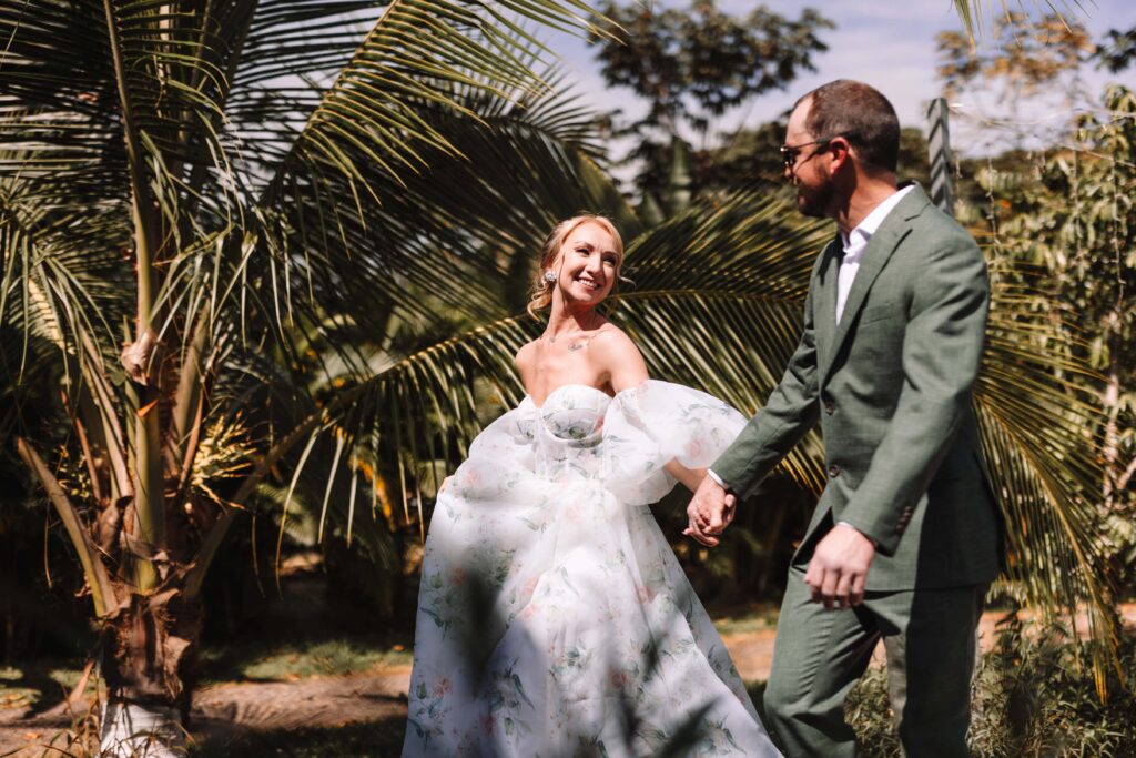 Bride and Groom take a walk in tropical nature.