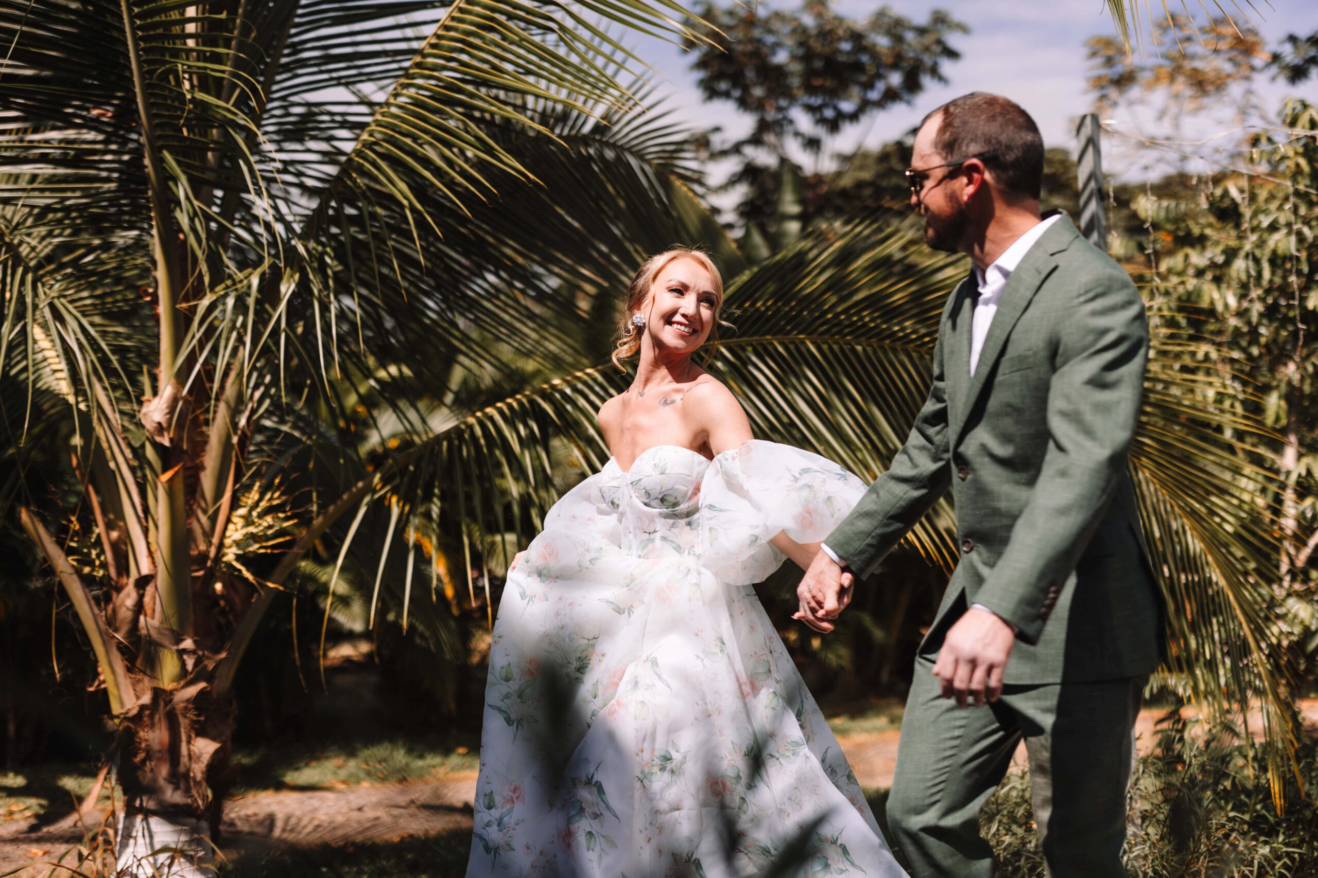Bride and Groom take a walk in tropical nature.