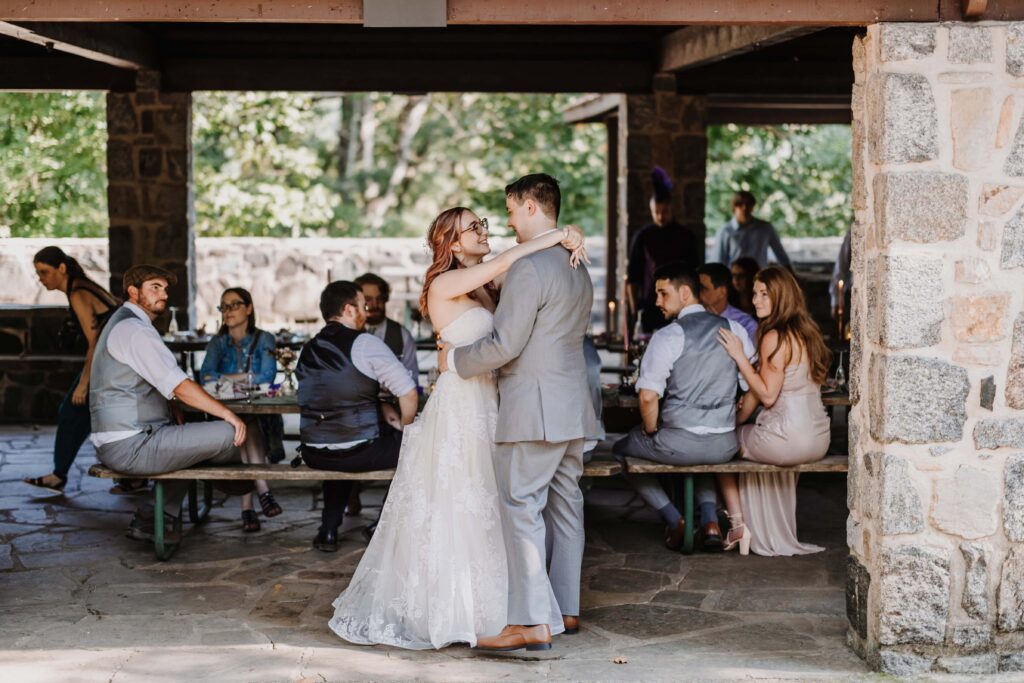 Newlyweds share a first dance at their Micro-wedding.
