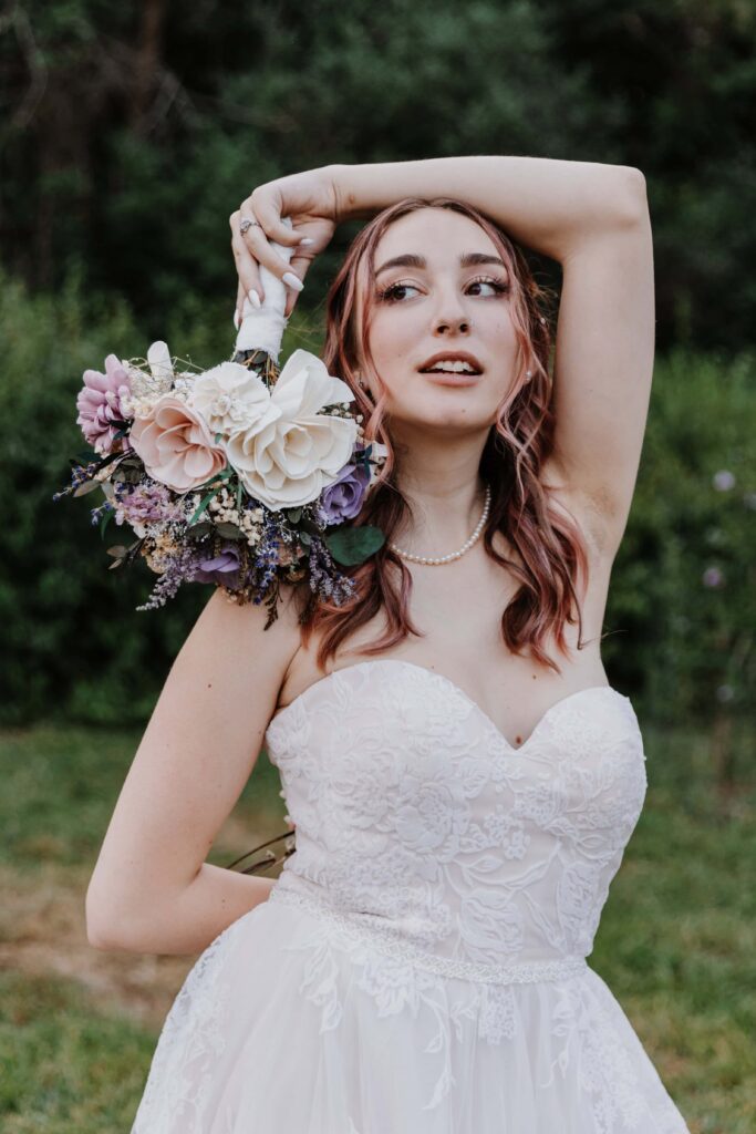 Gorgeous Micro-wedding bride with her Sola Wood bouquet.