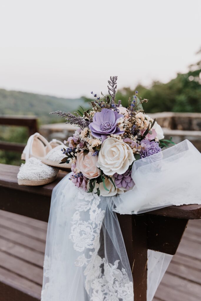 The bride's accessories: shoes, veil, and Sola Wood bouquet.