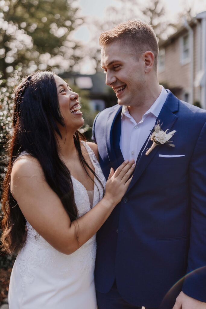 Bride and Groom sharing a laugh.