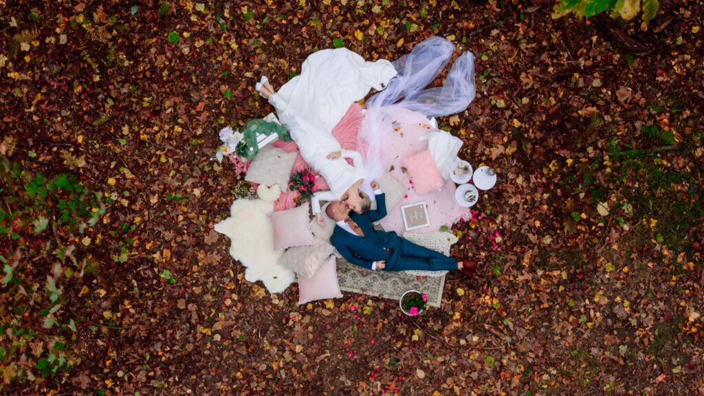 An arial shot of the newlyweds at their elopement picnic.