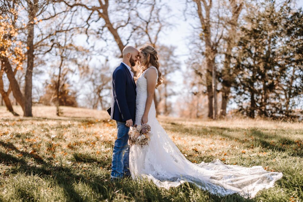Newlywed couple share a special moment on their farm. 