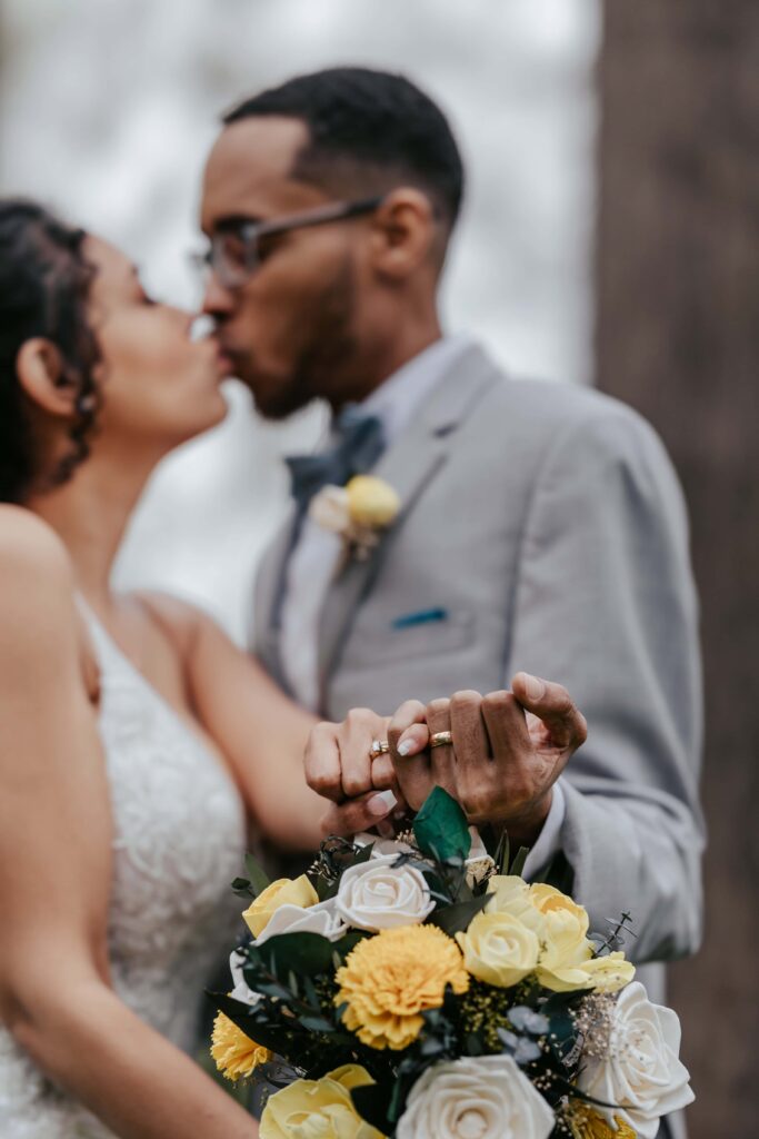 Pandemic Elopement Newlyweds holding hands.