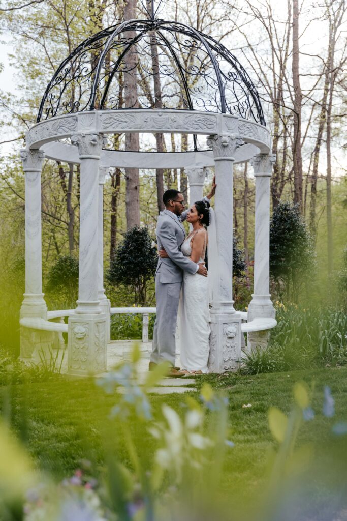 Newlyweds share a dance under the gazebo.