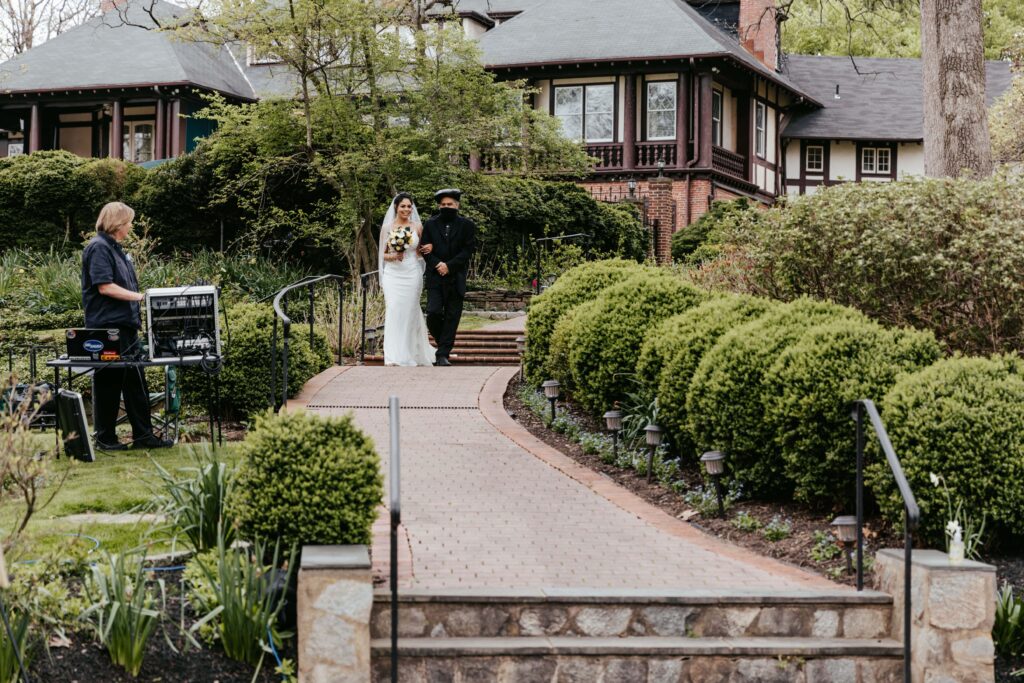 Bride walking down the long aisle path.