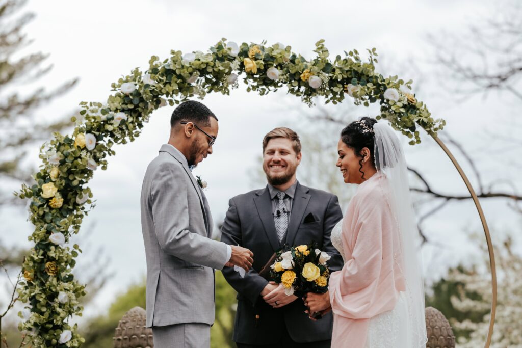 Pandemic Elopement under a perfect circle arch.