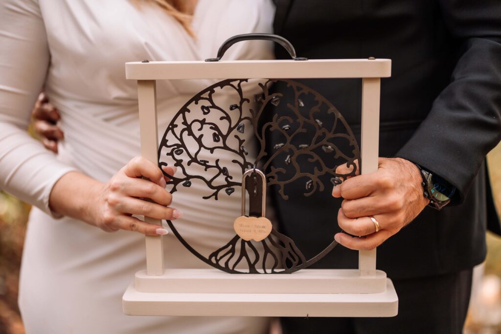 Couple preforming a love lock ceremony on their wedding day.