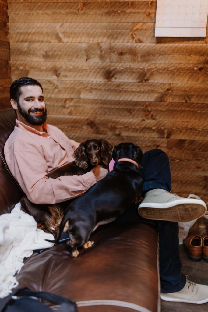 Groom and best man (dog) relaxing before the ceremony preparations begin.
