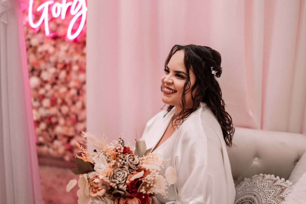 Joyful bride in our She Shed getting ready for her ceremony.