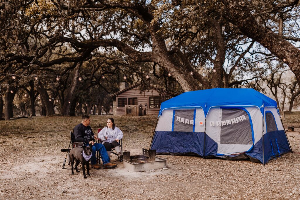 Couple camping out the eve before their wedding.