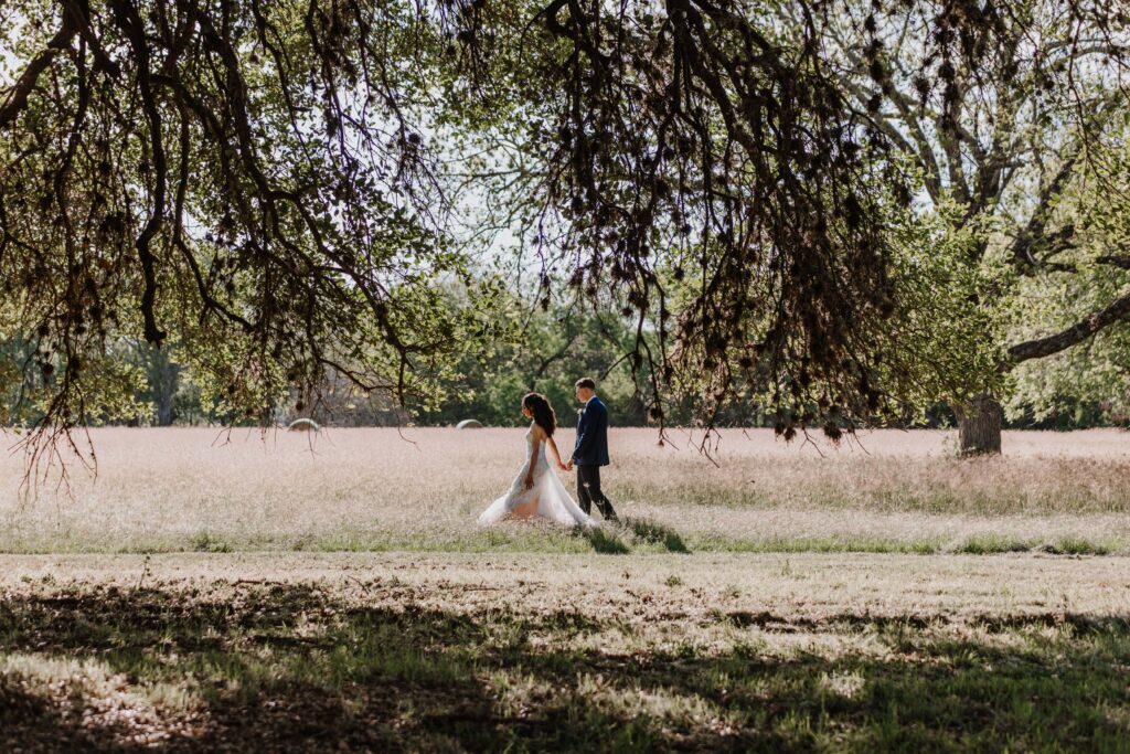 San Antonio Texas Small Wedding Venue Micro Wedding bride and groom walking_www.ezelopements.com