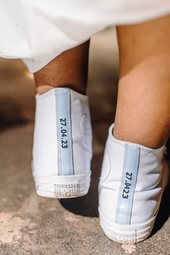 Custom wedding converse with the wedding date embroidered.