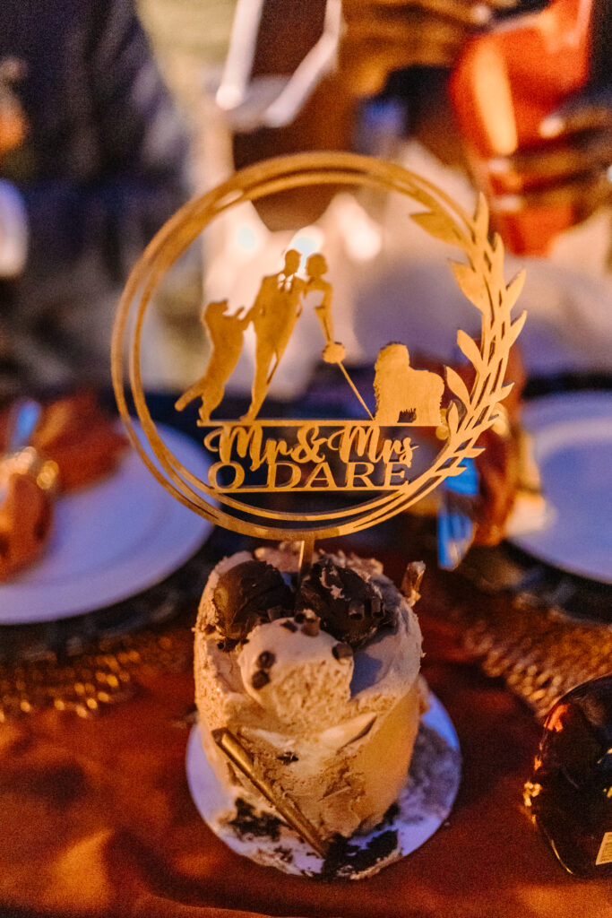 A wedding cake made for two with a custom cake topper.