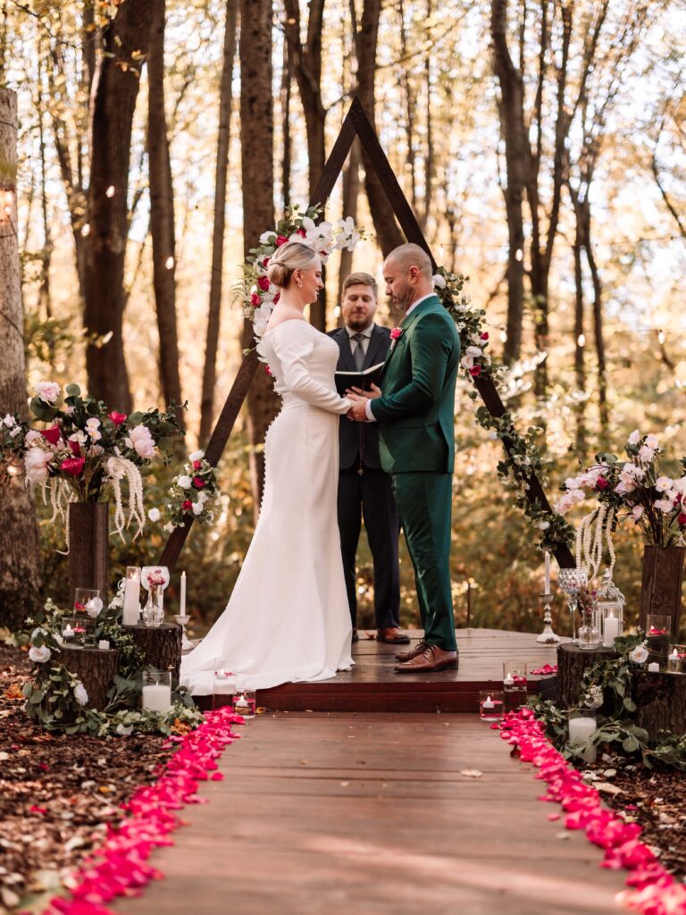 Scene from Rafaela and Marcus's stunning Forest Elopement as they exchange vows.