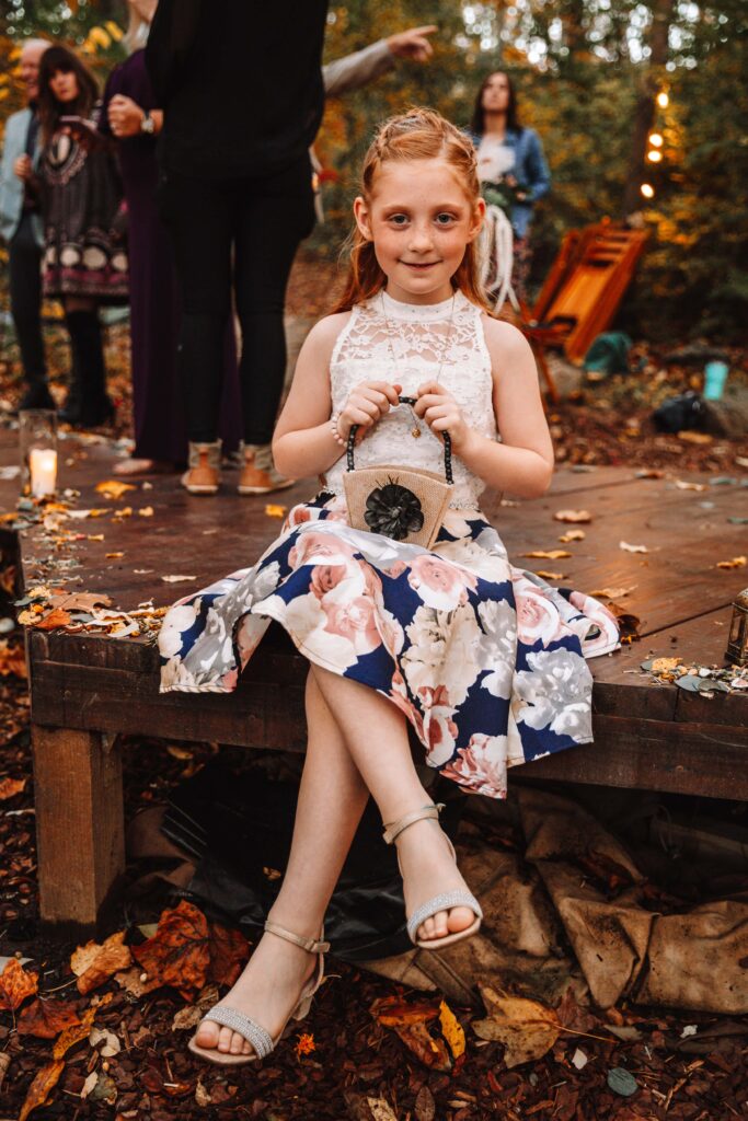 A lovely young flower girl ready for duty.