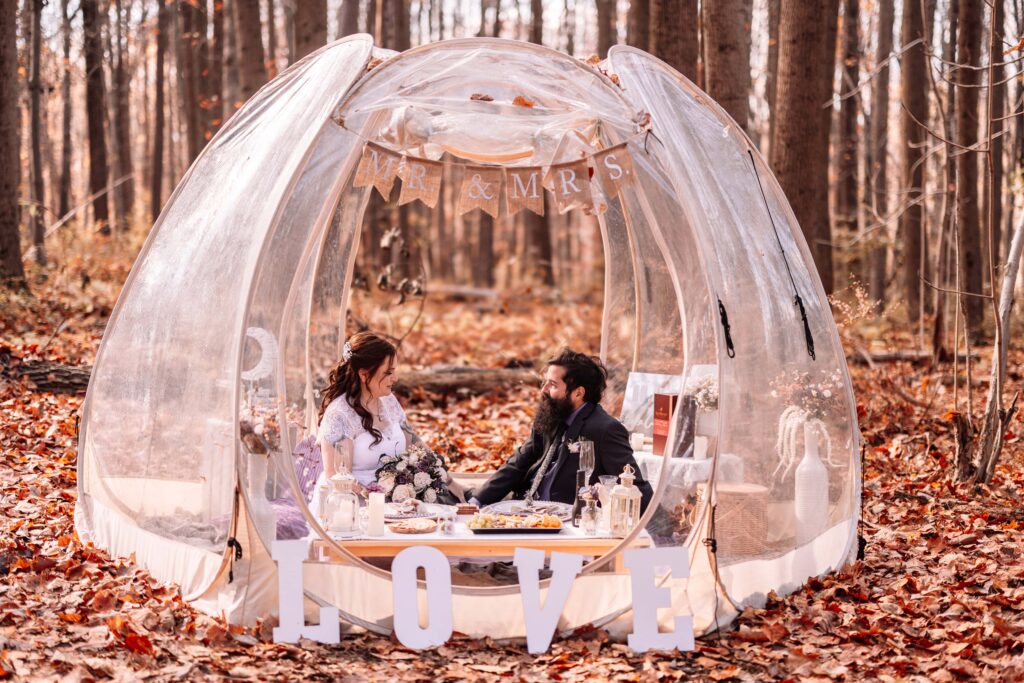 Couple enjoying their eco-friendly picnic abiding by leaving no trace policies.