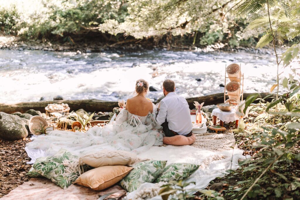 Bride and groom share in a luxury picnic after their Costa Rican elopement. 