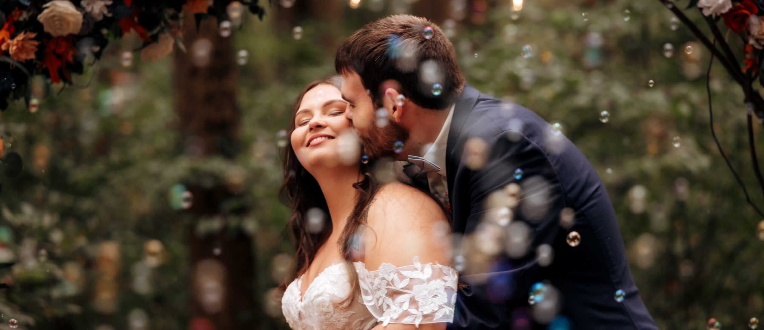Lovely couple sharing an embrace during their golden hour photo session post ceremony.