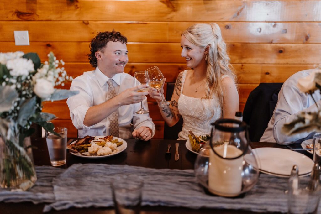 Bride and Groom toast at their intimate reception.