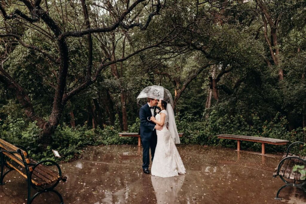A couple during their simple elopement at River Legacy Park in Texas. One of our favorite Texas budget-friendly wedding locations.