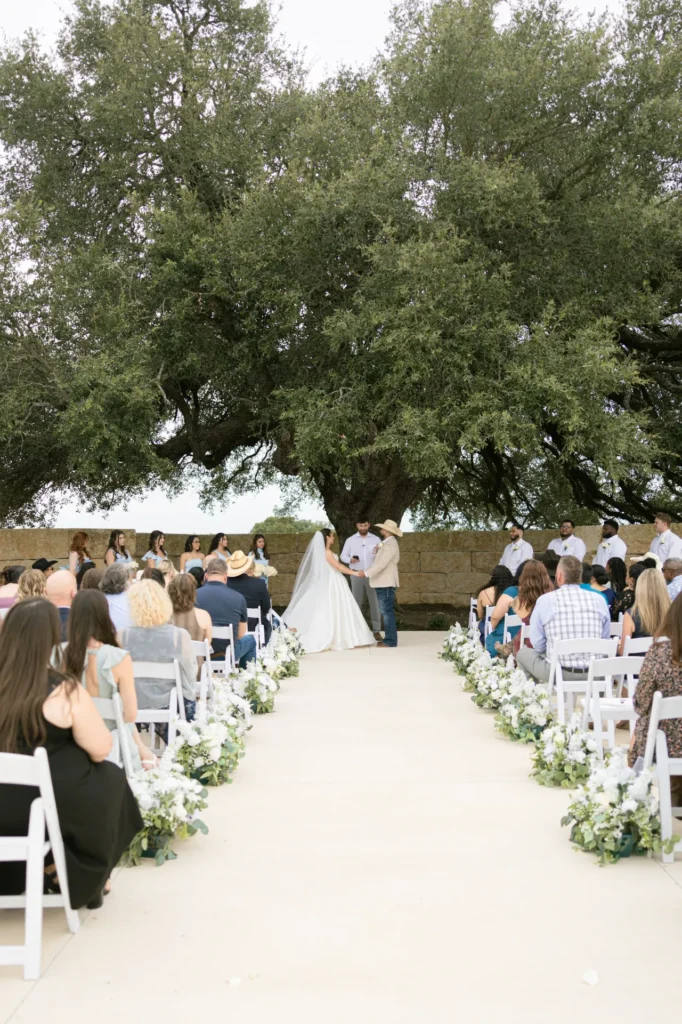 An outdoor ceremony at 1281 Weddings and Events venue in Texas.